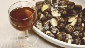 Copa de jeropiga y castañas asadas